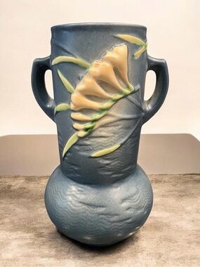 Vintage 1940 Large Roseville Pottery blue Freesia vase with two handles.